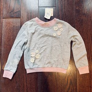 NWT. Truly Me Top with flower appliqués .